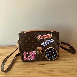 Louis Vuitton crossbody patches purse